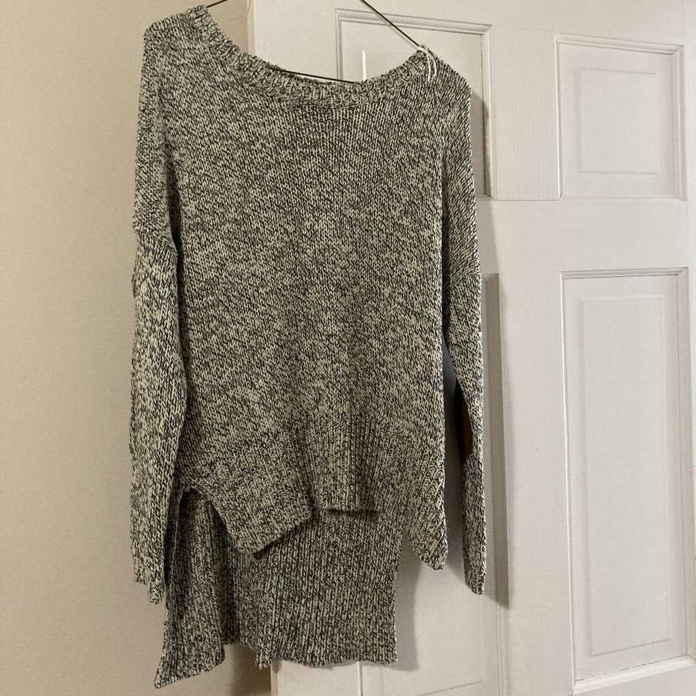 Black & white sweater with brown elbow patches